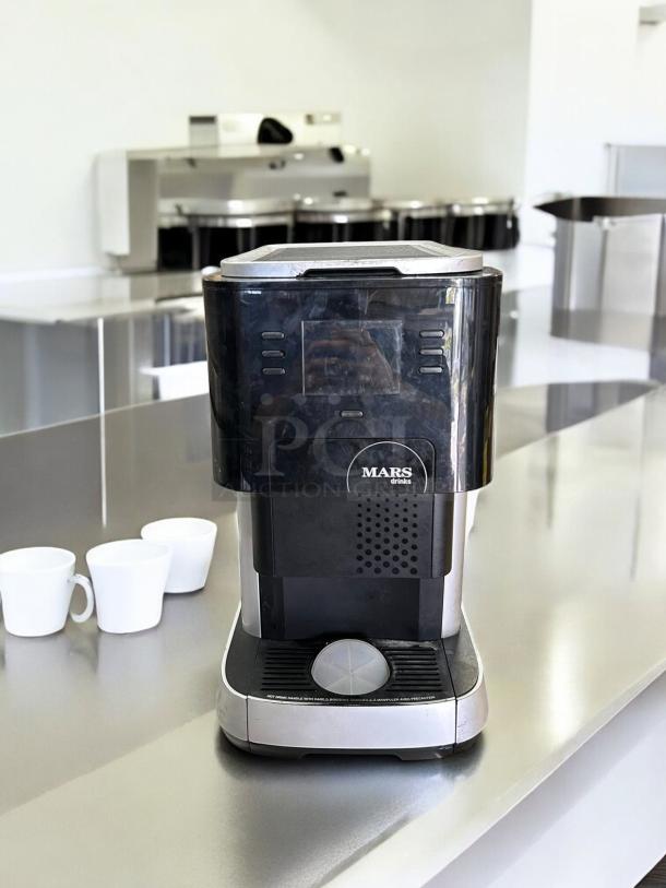 FLAVIA MDKL1NA Mars/Creation 500 black brewer, 115v, good condition, tested & working, Mars Drinks label visible.