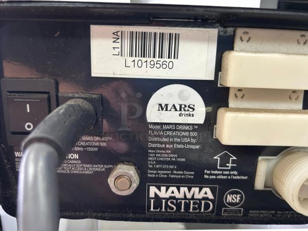 FLAVIA MDKL1NA Mars Creation 500 brewer, good condition, black, 115v, tested & working. Shows labels and power switch.