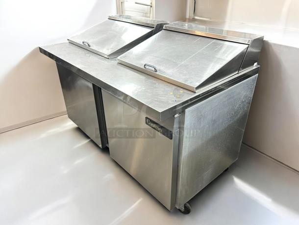 Continental SW60-24M 60" sandwich prep table with 2 doors, stainless steel, 24 pans capacity, great condition, tested working.