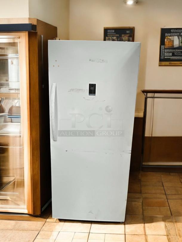 Insignia 17 Cu. Ft. white upright freezer, garage-ready, convertible, ENERGY STAR certified. Great condition, tested & working.