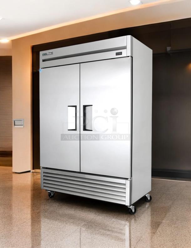 True T-49-HC 54" two-section reach-in refrigerator, 115v, stainless steel, dual doors, on casters, tested and working.
