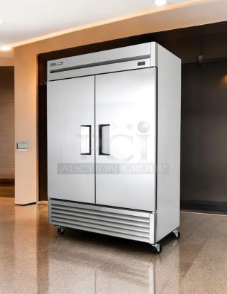 True T-49-HC 54" two-section reach-in refrigerator, 115v, stainless steel, dual doors, on casters, tested and working.