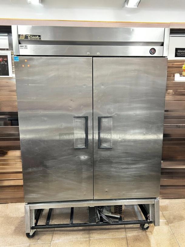 True T-49-HC 54" Reach In Refrigerator, two-section, tested and working, stainless steel, 115v, visible brand label.