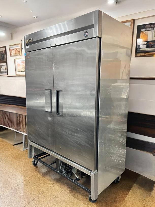 True T-49-HC 54" two-section reach-in refrigerator, stainless steel, double doors, tested and working, 115v, excellent condition.