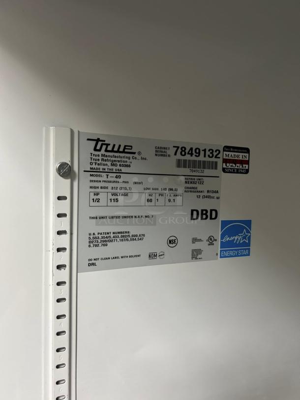 True T-49-HC reach-in refrigerator label, showing model number, specifications, and Energy Star certification.