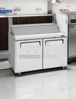 Turbo Air MST-48-N 48" stainless steel refrigerated sandwich prep table, featuring two doors and a two-tier overshelf, in great condition.