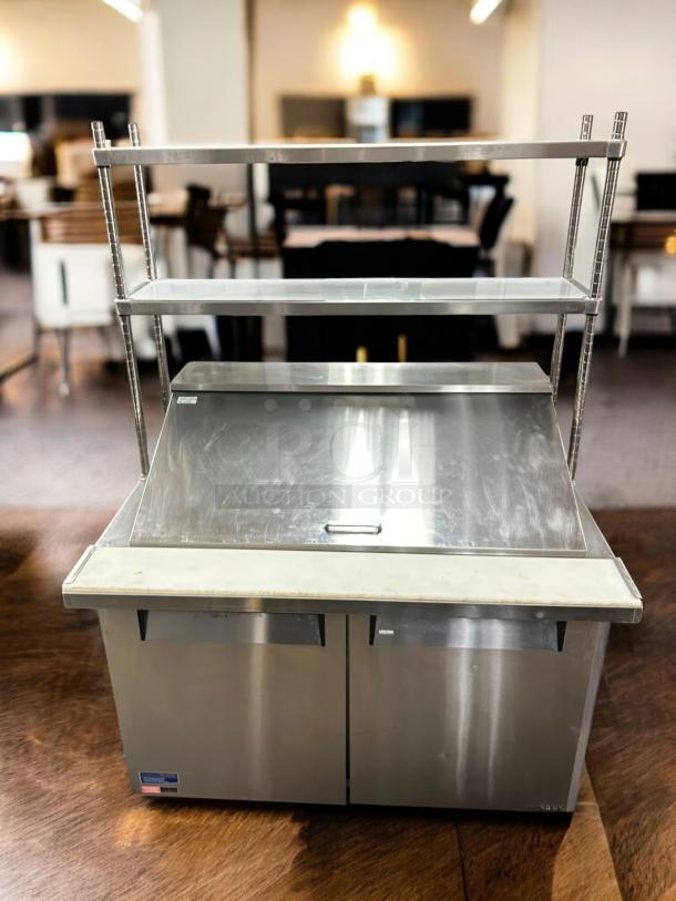 Turbo Air MST-48-N 48" stainless steel refrigerated prep table with 2-door and 2-tier overshelf, excellent condition.