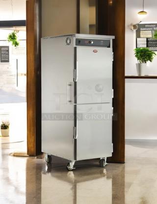 FWE UHST-12-OTB solid door mobile heated holding cabinet, 13 pan capacity, stainless steel, tested and working, on casters.