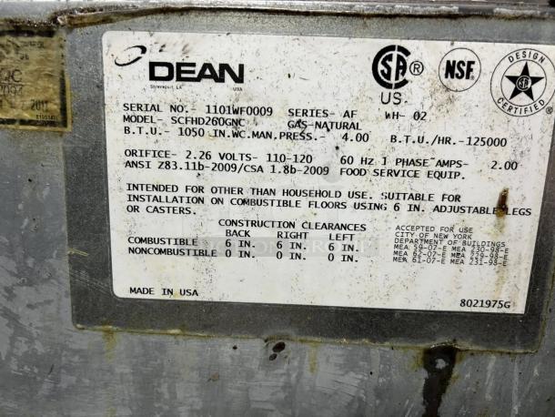 Frymaster SCFHD260G gas fryer label showing serial number, model, BTU rating, voltage, and safety certifications.