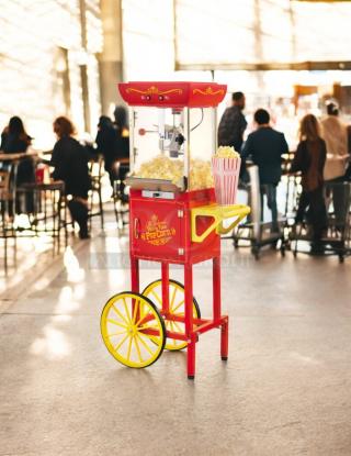 Nostalgia CCP-200 popcorn machine cart, red, 0.25 cups oil capacity, freestanding, yellow wheels, tested, working condition.