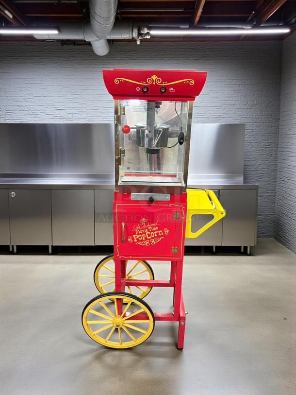 Nostalgia model CCP-200 popcorn machine cart in nice condition, red with yellow wheels, tested and working, 0.25 cups capacity.