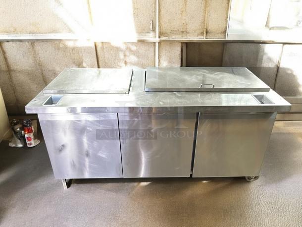 Continental SW72-N-18C 72" 3-door sandwich prep table in great condition. Stainless steel, tested, working.
