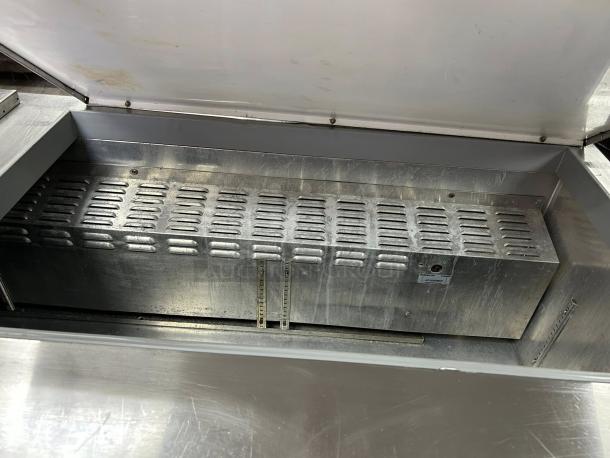 Continental Refrigerator SW72-N-18C sandwich prep table, 72", stainless steel, 3-door. Great condition, tested & working.