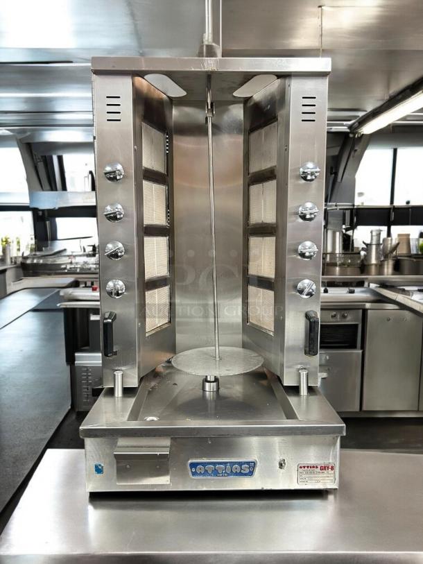 Attias GRY-8 electric gyro machine, 8 burners, in super nice condition. Tested, working, 120v/60hz/1ph. Model plate visible.