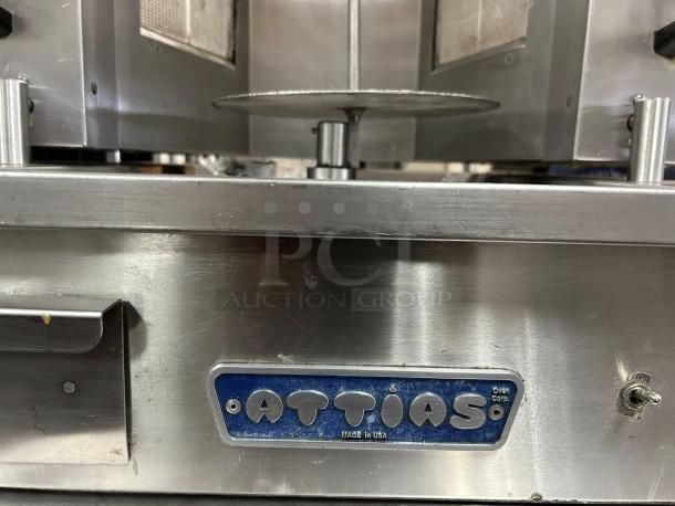 Attias GRY-8 8 Burner 100lbs Electric Gyro Machine, metallic finish, logo visible, excellent condition, tested working.