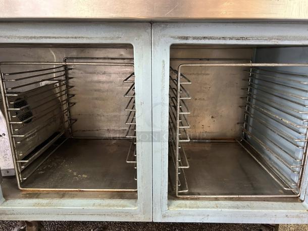Delfield 000-20191PTC 91in 3-door refrigerated pizza prep table, stainless steel, on casters. Clean interior, tested & working.