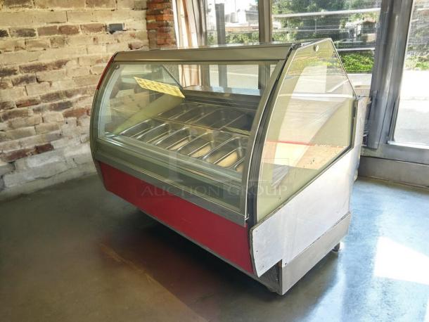 Oscartielle C83FK-9SC gelato case, great condition, 24 pan capacity, 220V, 1Ph, tested and working, glass display, red base.