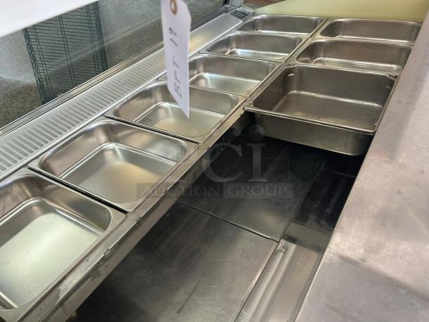 Oscartielle C83FK-9SC gelato case in great condition, featuring 24 stainless steel pans. Tested & working, 220V 1Ph.