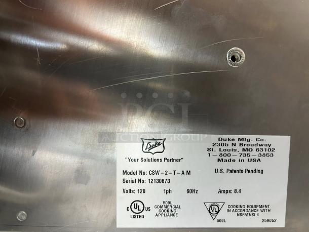 Duke CSW-2-T-AM electric countertop soup warmer, 2-well, 120V, tested and working. Model and serial number label visible.