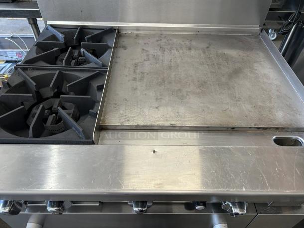 Atosa AGR-2B24GR gas range with 2 burners and 24" griddle. Clean condition, stainless steel, tested and working.