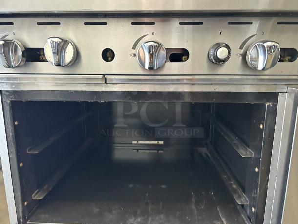 Atosa AGR-2B24GR 36" CookRite gas range, 2 burners, 24" griddle, stainless steel, clean, tested, and in working condition.