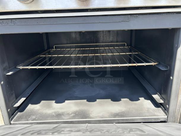 Imperial IR-6 Range, 6 burners, 1 oven, natural gas, great condition, interior view, stainless steel.