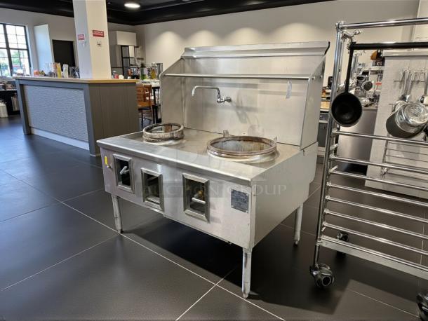 WESTAR C-2 double wok burner gas range, stainless steel, tested and working, visible faucet, used condition.