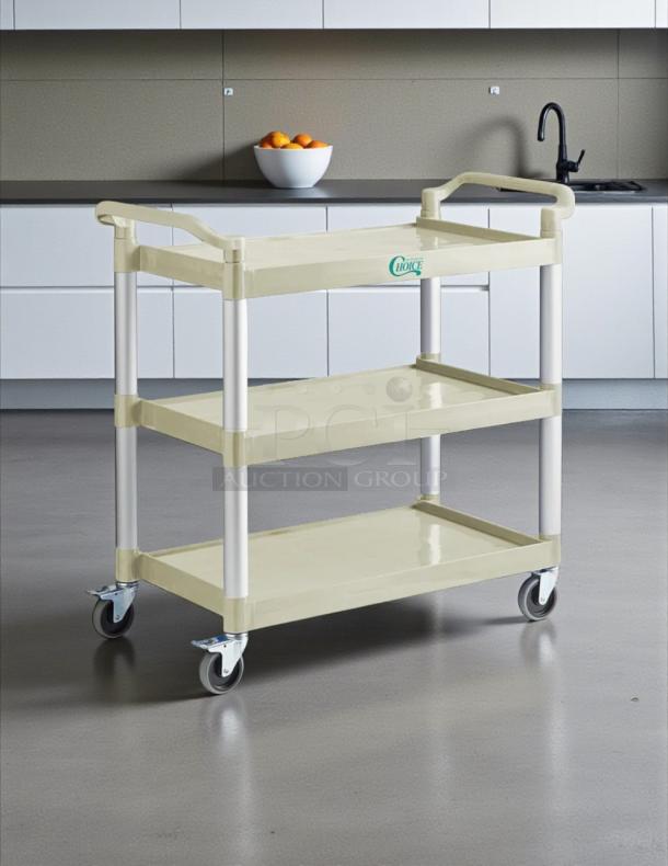 Brand new Choice beige utility cart, 42"x20", with three shelves. Includes handles, wheels, and Choice logo on the side.