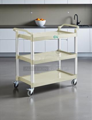 Brand new Choice beige utility cart, 42"x20", with three shelves. Includes handles, wheels, and Choice logo on the side.