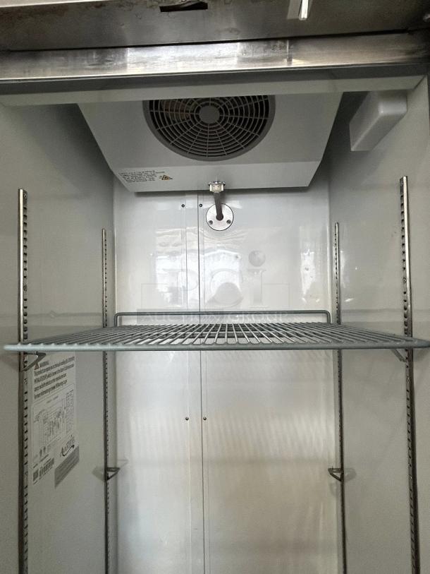 Avantco Model 178A19FHC 29" Reach-In Freezer, solid door, tested, working, good condition, interior view with shelving.