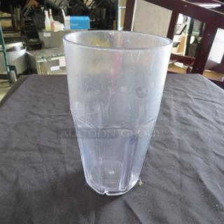 Clear polycarbonate glass from a lot of approximately 60, gently used, durable with a sturdy design, ideal for bulk purchase.
