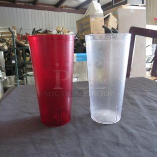24oz red and clear poly glasses, durable; in good condition. Ideal for drinks. Sold as one mega lot.