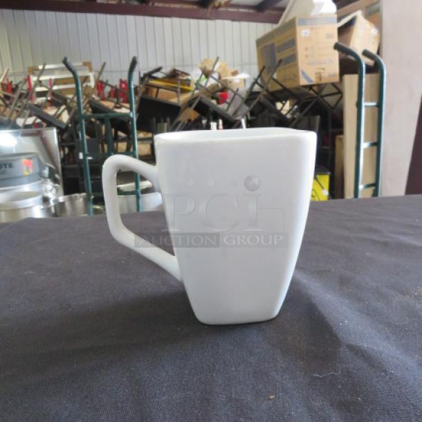 Set of APP 40 iti coffee cups, white ceramic, modern design, gently used condition, ideal for cafes or home use.