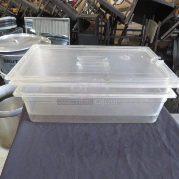 Full-size, 4-inch deep food storage container with lid, clear plastic, used condition, ideal for kitchen or restaurant use.