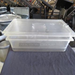 Full-size, 4-inch deep food storage container with lid, clear plastic, used condition, ideal for kitchen or restaurant use.