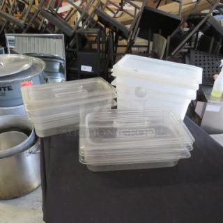 Assorted 1/3 size food storage containers with lids, clear and white, stackable, good condition, suitable for kitchen use.