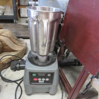Waring Heavy Duty Blender, Model CB15N, stainless steel, no lid, 120V, controls visible on base, valued at $2130.00.