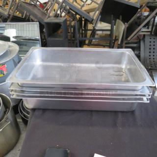 Full size 4-inch deep hotel pan, stainless steel, stack of four, used condition. Ideal for commercial kitchen use. 4XBID.