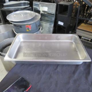 Full-size 2.5-inch deep hotel pan. Stainless steel, industrial use. Good condition, minor wear. Ideal for catering or restaurant use.