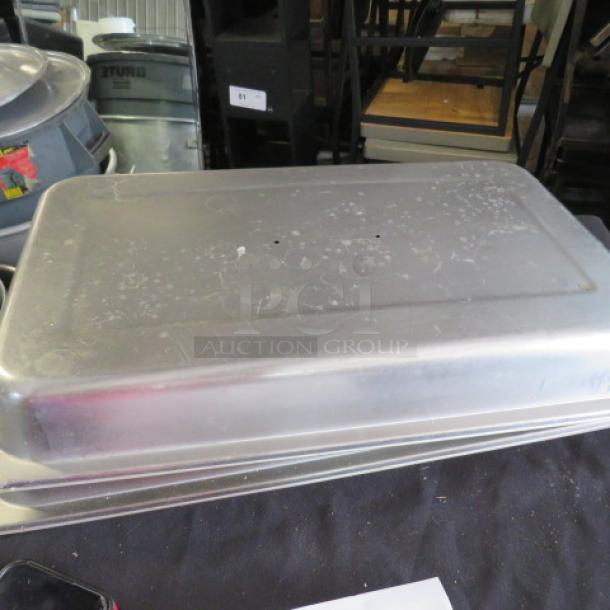 Full-size chafer lid, stainless steel, no handle, slightly scratched surface, item marked "4XBID."