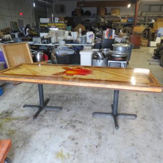 Custom wooden laminated table top with artwork, dual pedestal base, 96x36x30 inches, excellent condition.