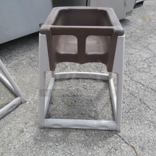 Poly high chair with brown seat and white frame, used condition, suitable for indoor or outdoor use.