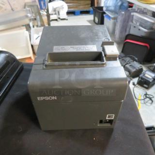 Epson Thermal Printer M267D, black, used. Ethernet port, power button on top. Ideal for retail or hospitality environments.