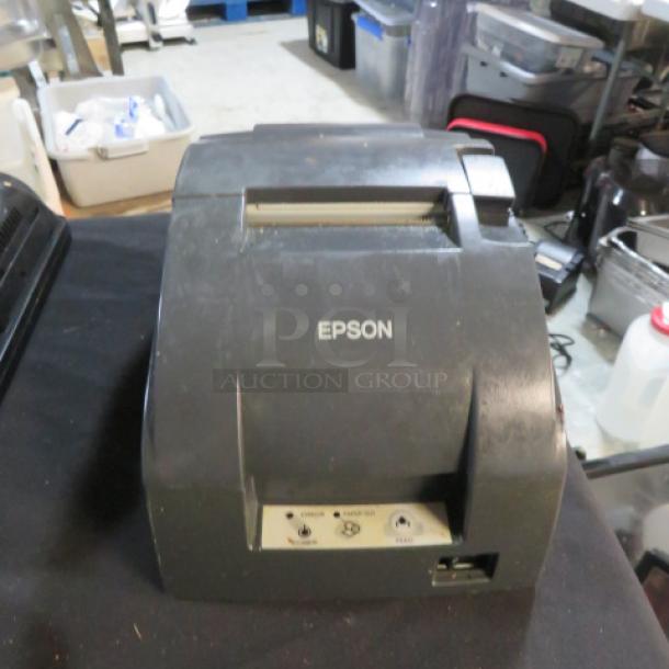 Epson M188B thermal printer, black, pre-owned, visible power and feed buttons, model number labeled on front.