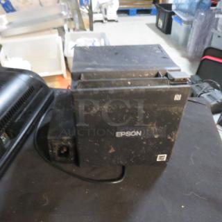 Epson M362B thermal printer, visible wear, black, power cable attached, Epson branding on front.