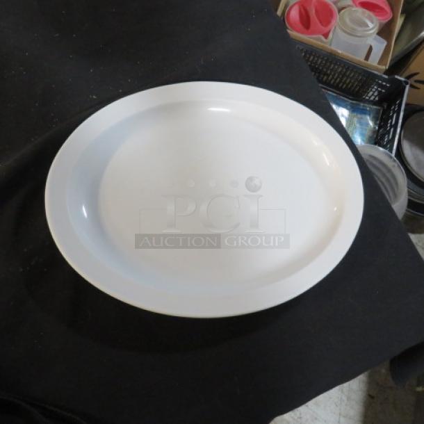 White oval platter, 11.5x9.5 inches, smooth finish, excellent condition, no visible markings or defects.