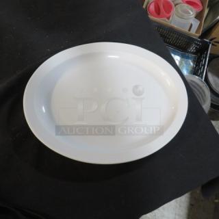 White oval platter, 11.5x9.5 inches, smooth finish, excellent condition, no visible markings or defects.