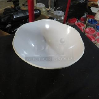 9-inch melamine bowl with white finish, smooth surface, and contoured shape. Model 9XBID. Good condition.