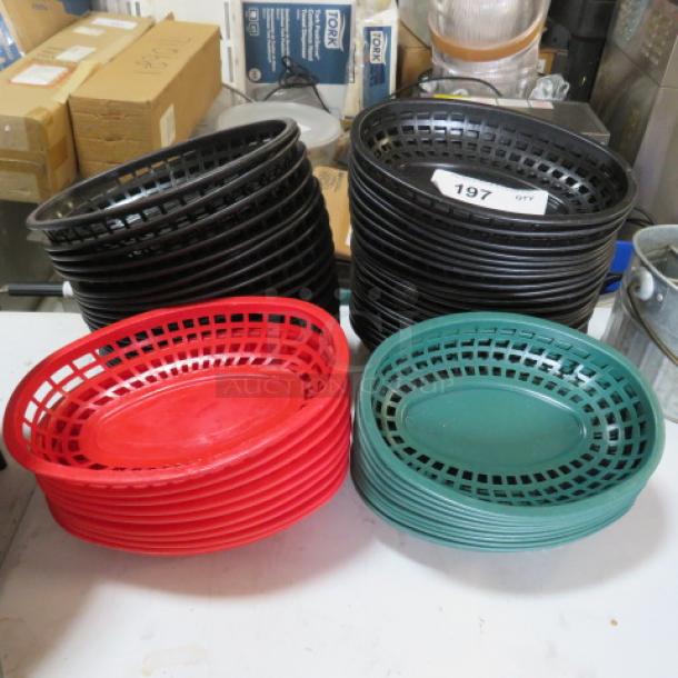 Stacks of fast food baskets in black, red, and green; marked with label showing quantity as 197.