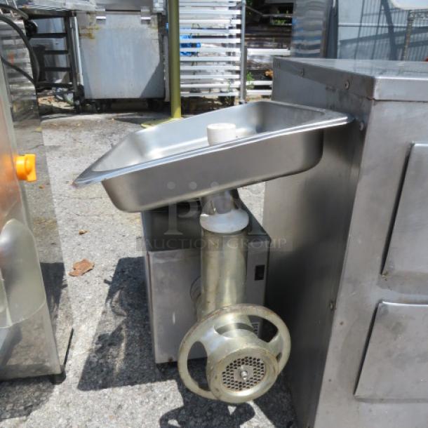 One Pro Cut Meat Grinder, stainless steel, 115 volt, industrial-grade, used condition, visible wear.
